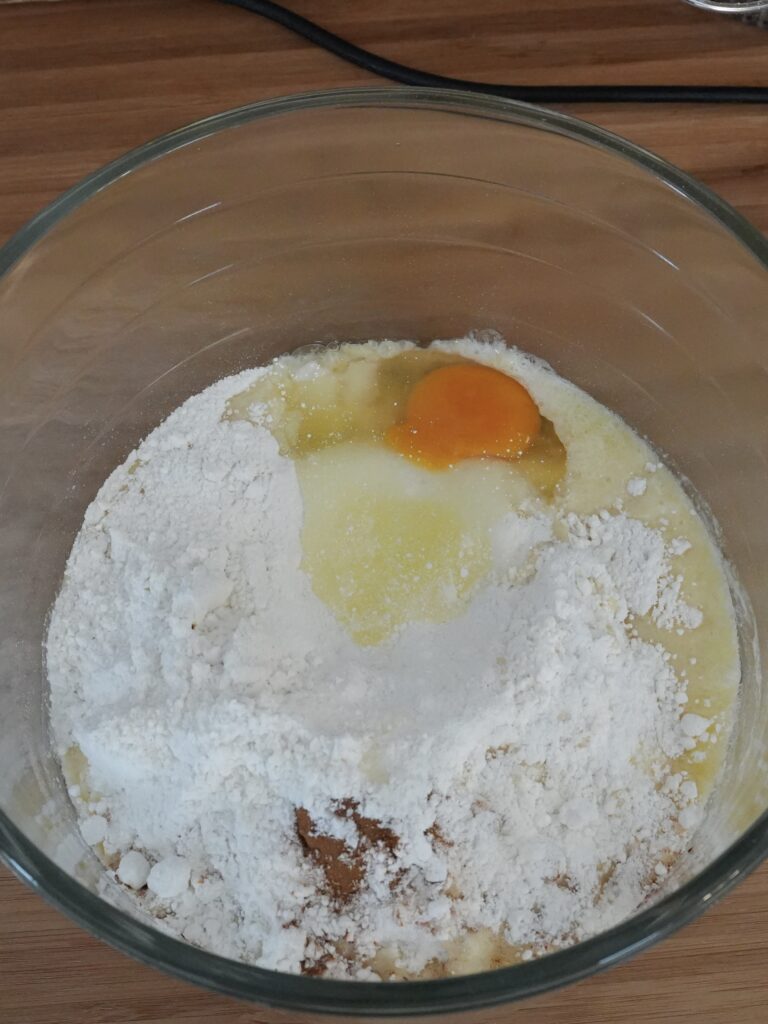 dry yellow cake mix, melted butter, egg, and ½ teaspoon cinnamon