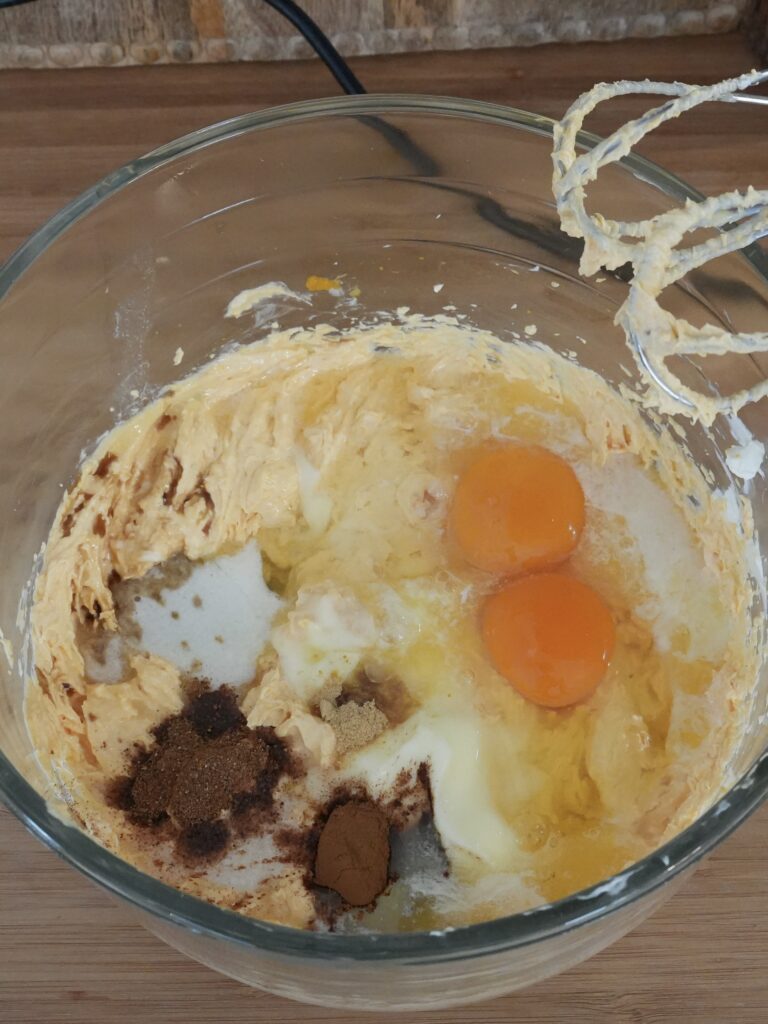 2 large eggs, melted and cooled butter, vanilla extract, cinnamon, nutmeg, ginger, and pinch of salt.